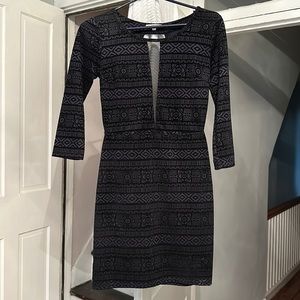 Dress with tribal design in velvet